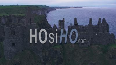 Dunluce Castle On The Antrim Coast, Northern Ireland. Aerial Drone Pull Away