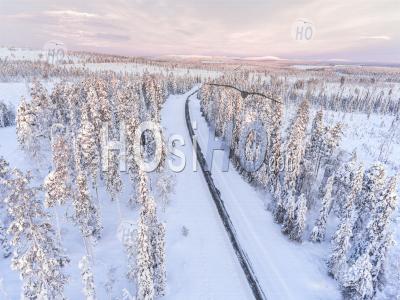 Dangerous, Icy Winter Roads In Bad, Slippery, Ice And Snow Covered Driving Conditions In Beautiful Road Trip Scenery Landscape - Aerial Photography