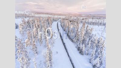 Dangerous, Icy Winter Roads In Bad, Slippery, Ice And Snow Covered Driving Conditions In Beautiful Road Trip Scenery Landscape - Aerial Photography