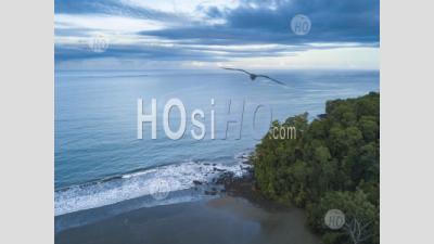 Arco Beach And Rainforest At Sunrise, Uvita, Puntarenas Province, Pacific Coast Of Costa Rica - Aerial Photography
