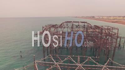 Fire Damaged Old Burnt West Pier, Brighton, Sussex, England. Aerial Drone View