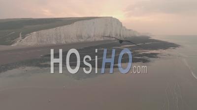Seven Sisters Cliffs, An Iconic British Landscape At Sunset, South Downs National Park, England. High Aerial Drone View
