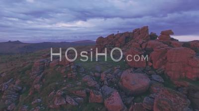Photographers In Dartmoor National Park At Sunrise, Devon, England, Uk. Aerial Drone View