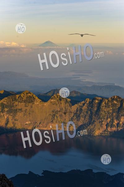 Sunrise View Of Mount Segara Anak Lake, Mount Agung And The Thre Gili Isles From The Summit Of Mount Rinjani, Lombok, Indonesia