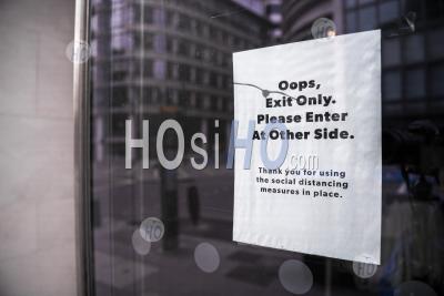 Coronavirus Covid-19 Sign In Shop Window In Lockdown Encouraging Social Distancing In Shopa Shut In London On A Shopping High Street At Oxford Street In The Pandemic In England, Uk, Europe