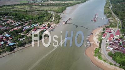 Aerial View Boat Back To The Village At Kuala Muda - Video Drone Footage