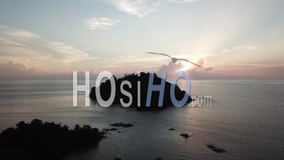 Aerial View Of A Sunset With Ray At Pulau Sayak - Video Drone Footage