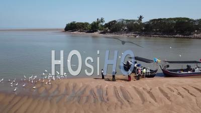 Fisherman Clean Fishing Net - Video Drone Footage