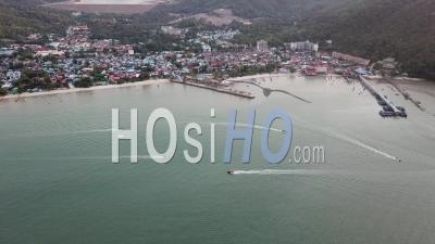 Boats Sail At Teluk Bahang Coastal - Video Drone Footage
