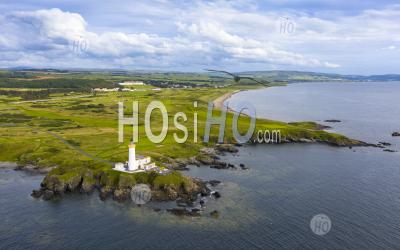 Aerial View Of Lighthouse At 9th Green On Ailsa Golf Course At Trump Turnberry Resort In Ayrshire, Scotland, Uk - Aerial Photography