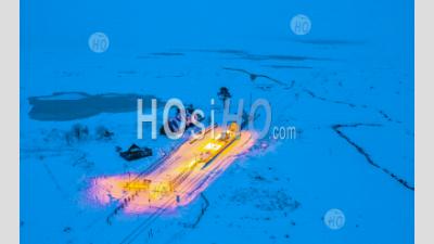Night Aerial View Of Corrour Railway Station In Winter The Highest In The Uk On Rannoch Moor, Scottish Highlands, Scotland, Uk - Aerial Photography