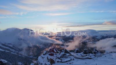 Aerial View Of Avoriaz 1800 (ski Resort) In Haute Savoie, France, Filmed By Drone In Winter Sunset, Between Resort, Mountain And Cliff, Auvergne Rhone-Alpes