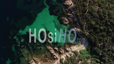 Top Shot Of The Coastline In Corsica - Video Drone Footage