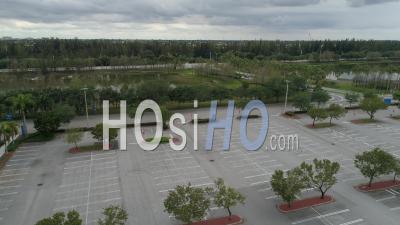 Parking Lot Empty At Pf Chang Restaurant In Dolphin Mall During Pandemic - Video Drone Footage