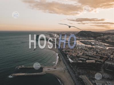 Aerial View Of Barcelona, Spain With Harbor And Skyline At Beautiful Sunset With Ocean View Hq - Aerial Photography