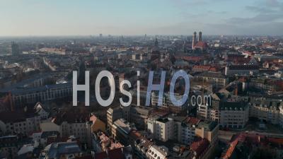 Beautiful City View Over Munich, Germany With Almost No Traffic At Isa Tor, Old City Gate And Frauenkirche Cathedral In Distance, Aerial View Above Munich In Autumn - Video Drone Footage