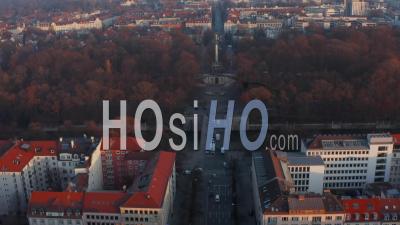 Slow Tilt Up Revealing Angel Of Peace Statue Monument In Munich, Germany In Winter With Car Traffic, Aerial Dolly In Forward - Video Drone Footage
