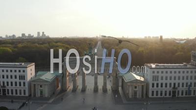 Aerial Over Brandenburger Tor With Almost No People In Berlin, Germany Due To Coronavirus Covid 19 Pandemic In Beautiful Sunset Light - Video Drone Footage