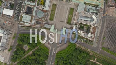 Aerial Slow Overhead Top Down View Circling Over Empty Brandenburg Gate In Berlin Central During Coronavirus Covid-19 Pandemic And Stay At Home Regulation In May 2020 - Video Drone Footage