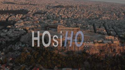 Aerial Perspective Circling Acropolis Of Athens In Golden Hour Sunset Light 4k - Video Drone Footage