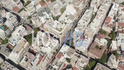 Vue Aérienne De Haut En Bas Sur Les Oiseaux D'athènes, En Grèce, Rues De La Ville à La Lumière Du Jour 4k - Séquence Vidéo Par Drone