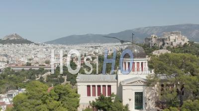 Aerial View Of National Observatory Of Athens With Acropolis And Mount Lycabettus In The Background 4k - Video Drone Footage