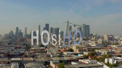 Towards Downtown Los Angeles, California Skyline In Beautiful Sunlight,Blue Sky, 4k - Video Drone Footage
