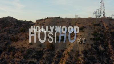 Flight Over Hollywood Sign,Letters Revealing What's Behind It At Sunset, Los Angeles, California 4k - Video Drone Footage