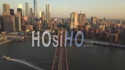 Flight Over Brooklyn Bridge With View Over Manhattan New York City Skyline At Sunset In Beautiful 4k - Video Drone Footage