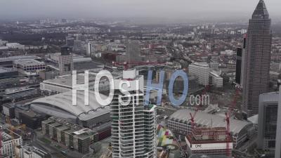 Aerial View Skyscraper In Construction With Crane On Top In Frankfurt Am Main, Germany On Cloudy Day 4k - Video Drone Footage