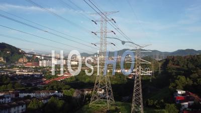 Aerial View Ascending Up Electric Tower - Video Drone Footage
