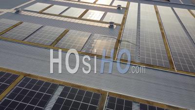 Sunny Sun Light Over Solar Panel Array - Video Drone Footage