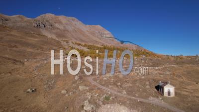 Larch Forest In Autumn Between Col De Vars And Pointe De L'eyssina, Above The Resort Of Vars, Hautes-Alpes, France, Viewed From Drone
