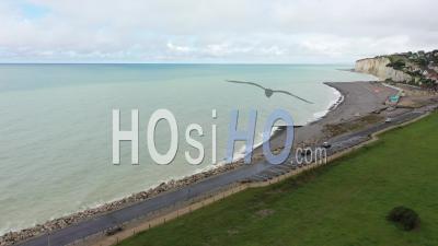 Beach Of Criel Sur Mer Under A Gray Sky - Video Drone Footage