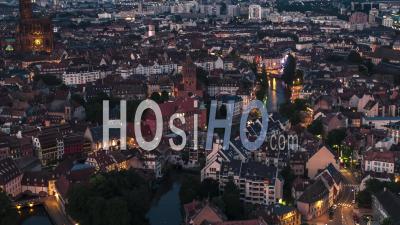 Establishing Aerial View Shot Of Strasbourg Fr, Capital Of European Union, Bas-Rhin, France, Old Town At Night Evening - Video Drone Footage