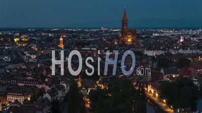 Establishing Aerial View Shot Of Strasbourg Fr, Capital Of European Union, Bas-Rhin, France, Old Town At Night Evening - Video Drone Footage