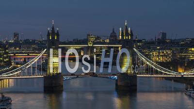 Establishing Aerial View Shot Of London Uk, United Kingdom, Iconic Tower Bridge At Night Evening - Video Drone Footage