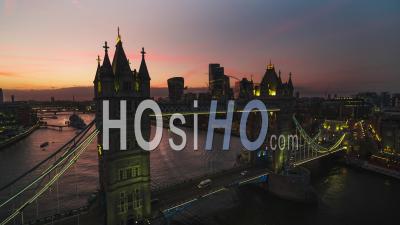 Establishing Aerial View Shot Of London Uk, United Kingdom, Colorful Sunset Over Tower Bridge - Video Drone Footage