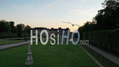 Luneville Castle And Its Garden Its Fountains At The Sunset - Video Drone Footage