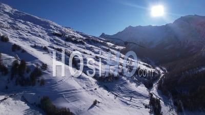 Snowy Valley Near Saint-Véran In Queyras, Hautes-Alpes, France, Viewed From Drone