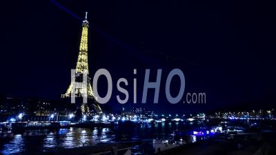 Seine River, Bridge And Monuments Of Paris At Night, During Christmas, Timelapse