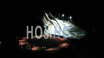 Night Aerial View Of The Complex Of Trampolines For Ski Jumping - Video Drone Footage