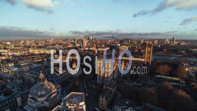 British Parliament, Westminster Abbey, Big Ben, London Eye, City Of London, Establishing Aerial View Shot Of London Uk, United Kingdom, Sunset Golden Hour - Video Drone Footage