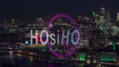 Westminster Parliament, London Eye, Westminster Abbey, Big Ben, Establishing Aerial View Shot Of London Uk, United Kingdom At Night Evening - Video Drone Footage