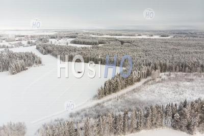 Small Barn House On The Snowy Fields - Aerial Photography