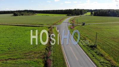 Road Leading Through The Fields - Video Drone Footage