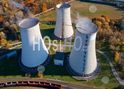Aerial View Of The Cooling Towers Of A Thermal Power Plant With Steam On Top Of The Tower - Aerial Photography