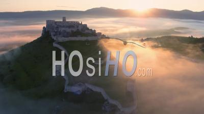 Flying Over Unesco Spis Castle, Lit By Morning Sun - Video Drone Footage