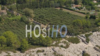 Remains Of The Roman Aqueduct Of Barbegal In Fontvieille, Alpilles Regional Natural Park, Surrounded By Olive Trees, Bouches-Du-Rhone, France - Video Drone Footage