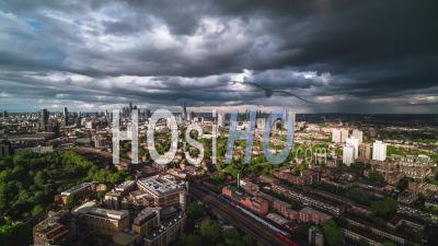 Atonishing Mix Of Stormy Clouds And Sun, City Skyline, Establishing Aerial View Shot Of London Uk, United Kingdom - Video Drone Footage